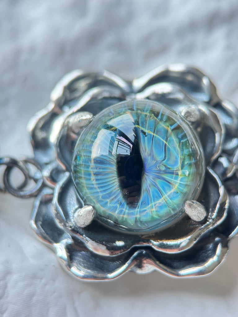 Glass eye blue topaz bracelet